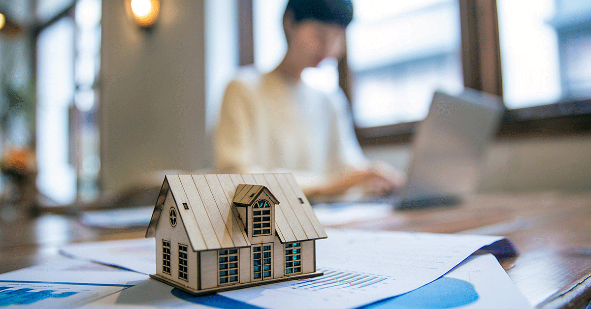 small model of a home on a tabletop